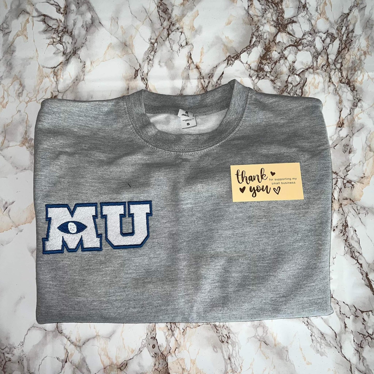 M U embroidered sweatshirt